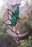 Fairy on moon stained glass