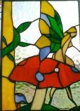 stained glass fairy on mushroom